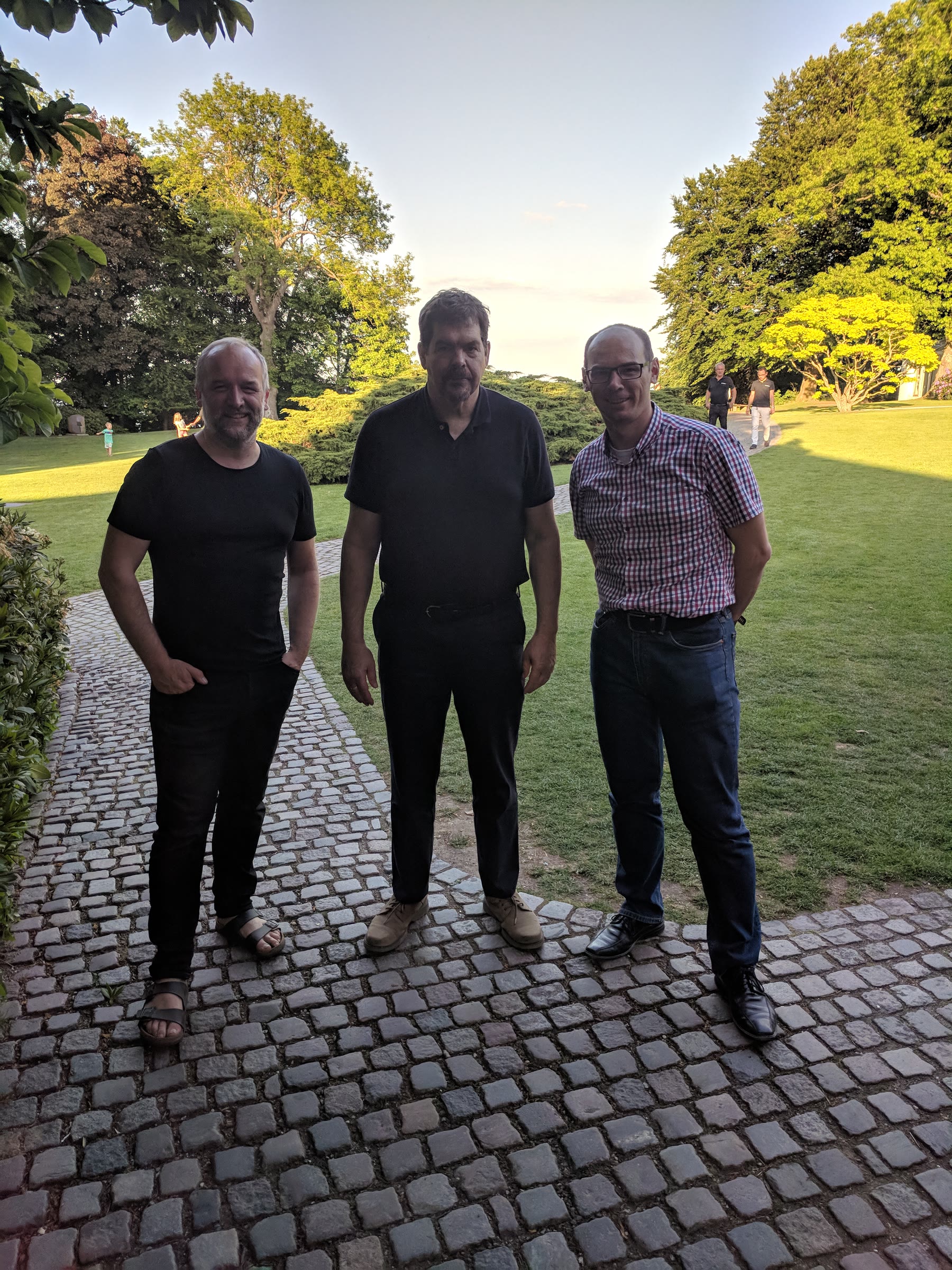 Bertel Schjerning with co-authors John Rust and Fedor Iskhakov in a garden